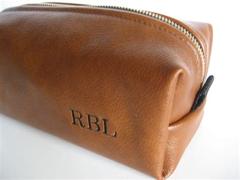 monogrammed leather men's toiletry bag.